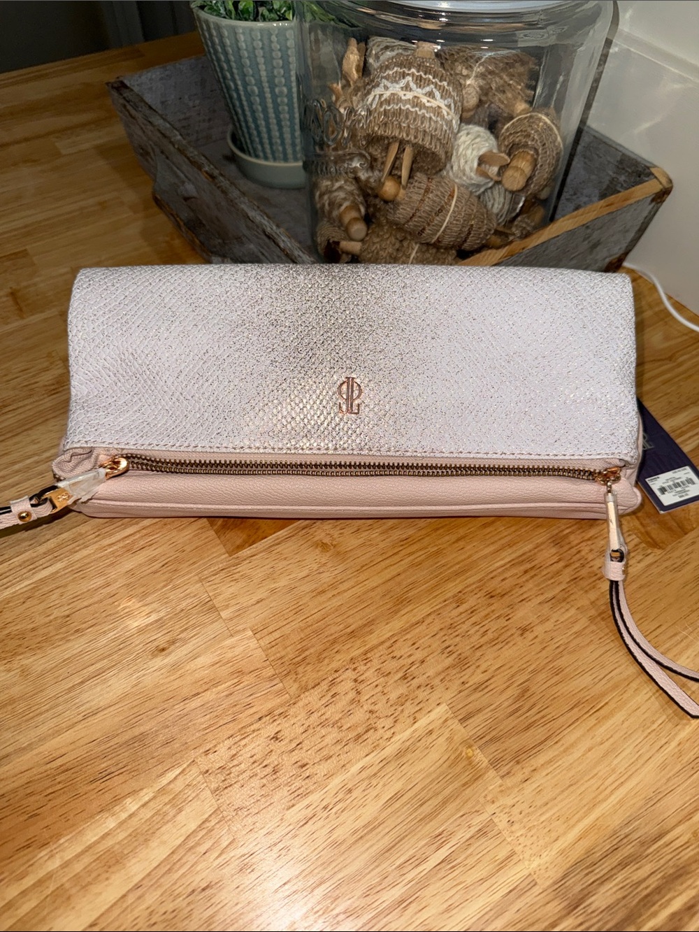 Jennifer Lopez Pale Pink Fold-Over Wristlet Clutch